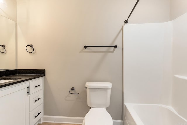 17 Woodhaven Dr, Cabot, AR 72023 - bathroom with vanity, toilet, baseboards, and  shower combination
