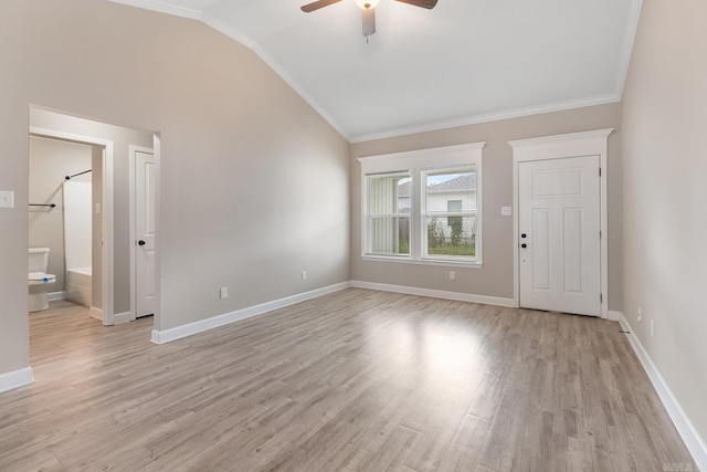 17 Woodhaven Dr, Cabot, AR 72023 - spare room featuring lofted ceiling, a ceiling fan, crown molding, light wood-type flooring, and baseboards
