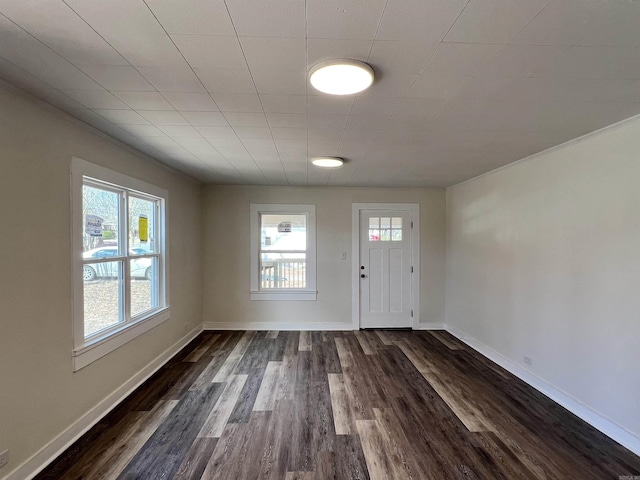 611 N Main St, Malvern, AR 72104 - entryway with healthy amount of natural light, dark wood-style flooring, and baseboards