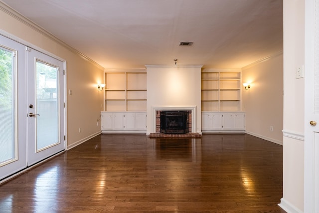 99 Kingsbridge Way, Little Rock, AR 72212 - unfurnished living room with ornamental molding, built in features, wood-type flooring, a fireplace, and baseboards