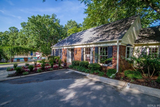 99 Kingsbridge Way, Little Rock, AR 72212 - view of front facade featuring brick siding