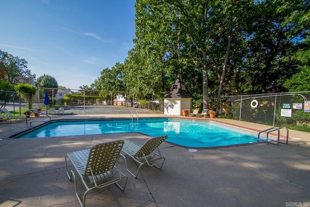 99 Kingsbridge Way, Little Rock, AR 72212 - community pool featuring a patio area