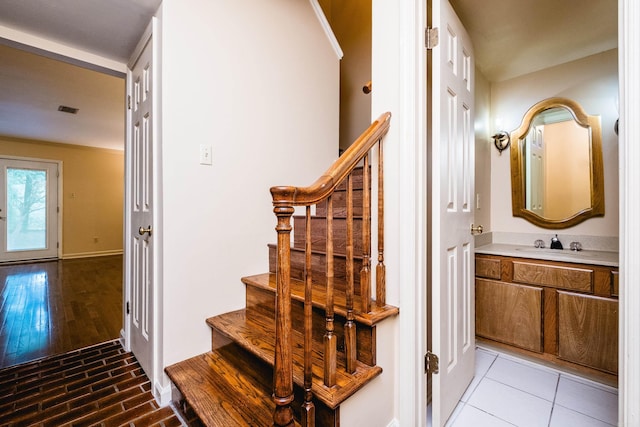 99 Kingsbridge Way, Little Rock, AR 72212 - staircase featuring baseboards