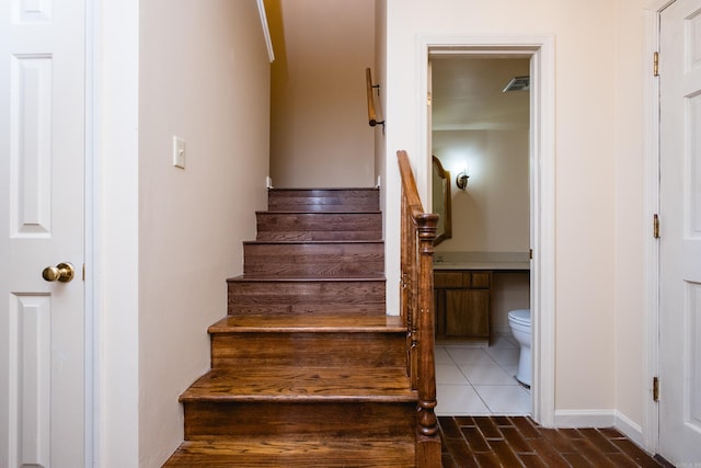 99 Kingsbridge Way, Little Rock, AR 72212 - stairway featuring baseboards