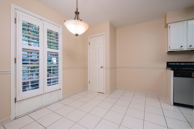 99 Kingsbridge Way, Little Rock, AR 72212 - kitchen featuring stainless steel dishwasher, white cabinetry, pendant lighting, and baseboards