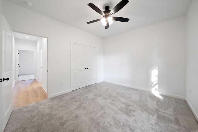 284 Shiloh, Beebe, AR 72102 - unfurnished bedroom with carpet flooring, baseboards, ceiling fan, and a closet