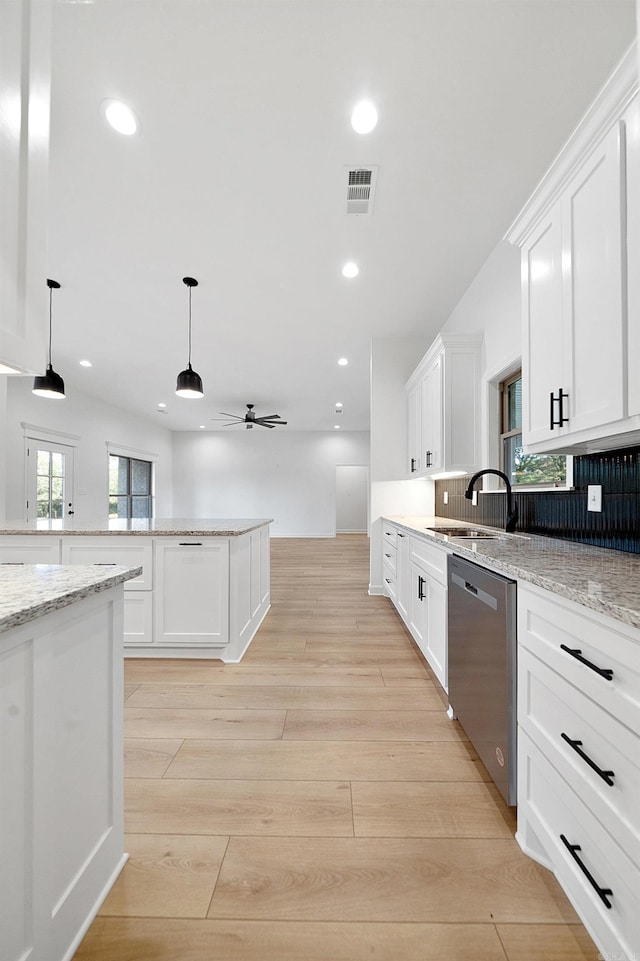 284 Shiloh, Beebe, AR 72102 - kitchen featuring dishwasher, white cabinets, ceiling fan, decorative light fixtures, and light wood-style flooring
