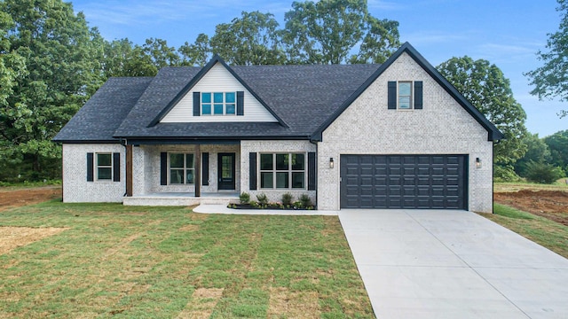 284 Shiloh, Beebe, AR 72102 - view of front of house featuring covered porch, brick siding, a front lawn, driveway, and a shingled roof