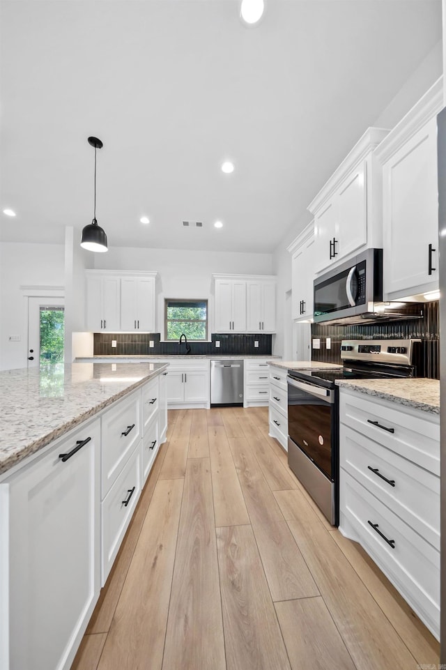 284 Shiloh, Beebe, AR 72102 - kitchen featuring stainless steel appliances, a sink, tasteful backsplash, plenty of natural light, and recessed lighting