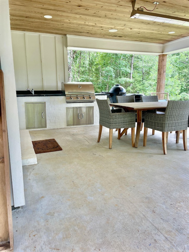 2441 Miller County 77, Doddridge, AR 71834 - view of patio with outdoor dining area and a sink