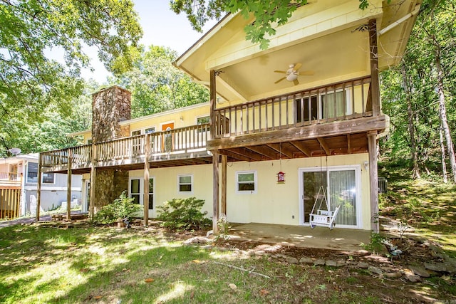 213 Pine Knot Rd, Fairfield Bay, AR 72088 - back of property featuring a deck, ceiling fan, and a patio