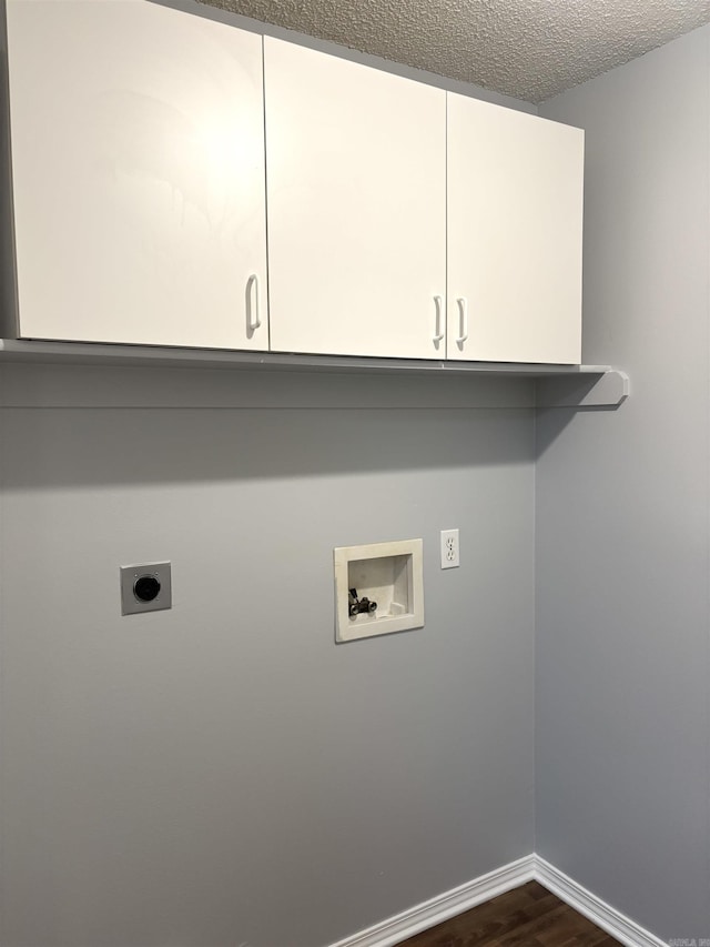 54 Redleaf Crk, Little Rock, AR 72210 - washroom featuring hookup for an electric dryer, washer hookup, cabinet space, dark wood finished floors, and baseboards