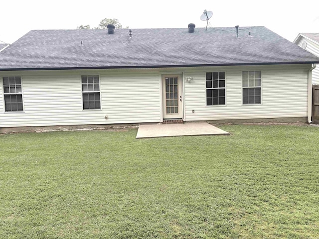 54 Redleaf Crk, Little Rock, AR 72210 - back of house with a patio area, roof with shingles, and a lawn