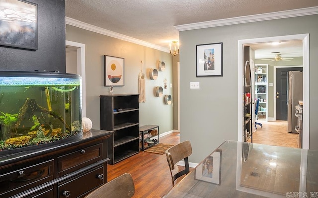 12 Wickford Ln, Little Rock, AR 72212 - living area featuring ornamental molding, a ceiling fan, and baseboards