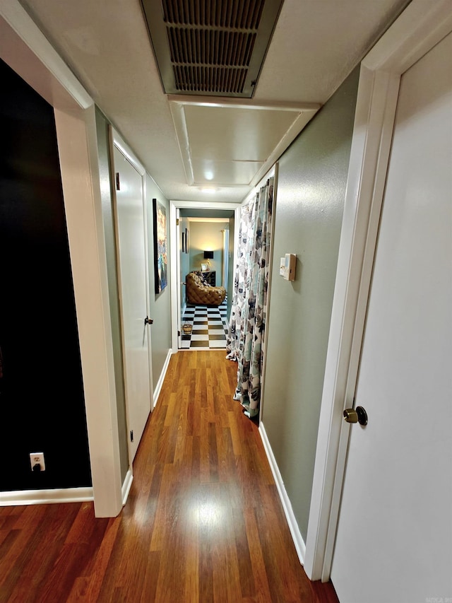 12 Wickford Ln, Little Rock, AR 72212 - corridor featuring wood finished floors and baseboards