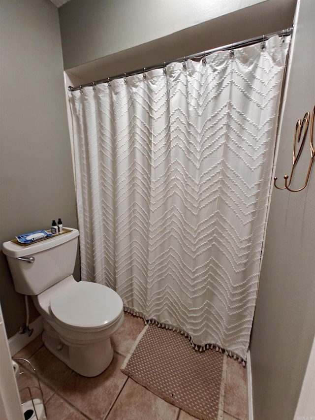 12 Wickford Ln, Little Rock, AR 72212 - full bathroom with toilet, tile patterned floors, and a shower with shower curtain