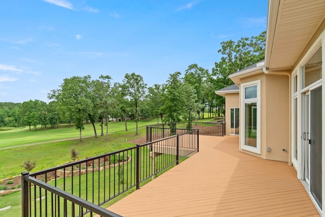 21 Diamante Blvd, Hot Springs Village, AR 71909 - deck with a lawn and view of wooded area