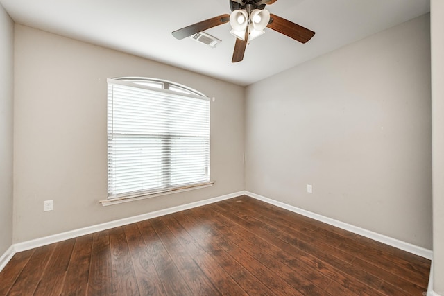 3305 Garden Club Dr, Bryant, AR 72022 - spare room with a ceiling fan, baseboards, and dark wood-style floors