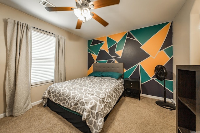 3305 Garden Club Dr, Bryant, AR 72022 - carpeted bedroom featuring multiple windows, baseboards, and a ceiling fan