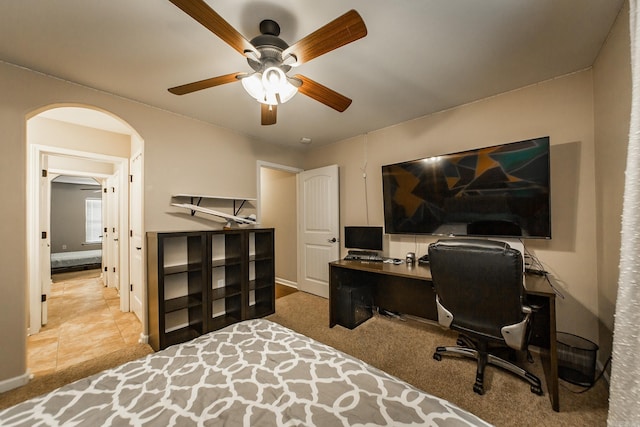 3305 Garden Club Dr, Bryant, AR 72022 - carpeted home office with a ceiling fan, arched walkways, and baseboards