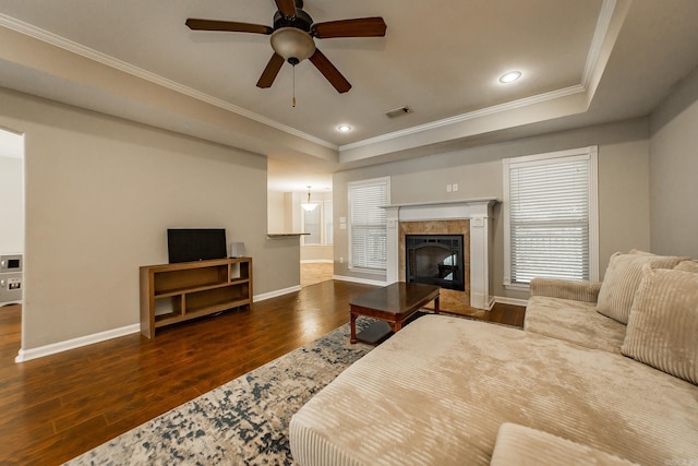 3305 Garden Club Dr, Bryant, AR 72022 - living room with wood finished floors, a tray ceiling, crown molding, baseboards, and ceiling fan