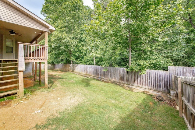 3305 Garden Club Dr, Bryant, AR 72022 - view of yard featuring stairway, a ceiling fan, and a wooden deck