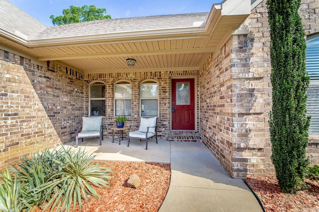 3305 Garden Club Dr, Bryant, AR 72022 - entrance to property with covered porch, brick siding, and a shingled roof