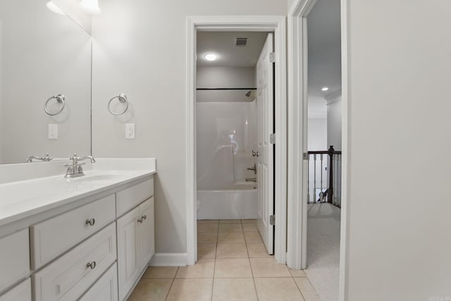 12714 Meadows Edge Ln, Little Rock, AR 72211 - bathroom with vanity, tile patterned flooring, baseboards, shower / washtub combination, and toilet