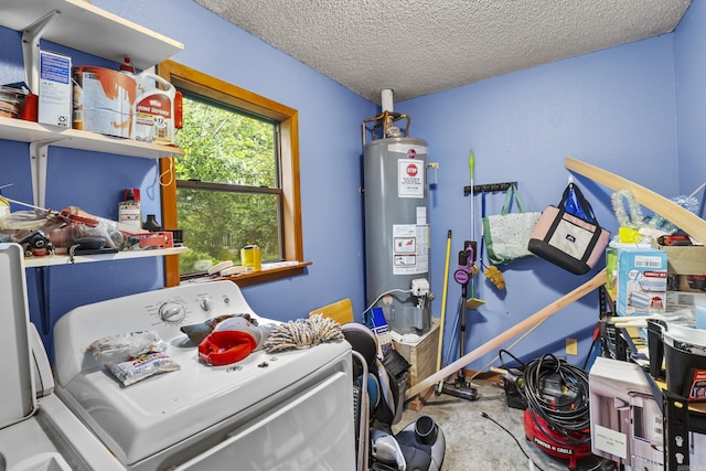 303 Pike Rd, Benton, AR 72019 - rec room featuring gas water heater, washing machine and dryer, a textured ceiling, and concrete floors