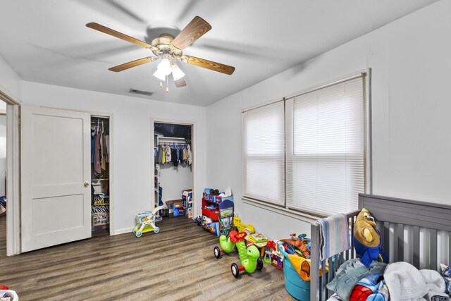303 Pike Rd, Benton, AR 72019 - game room with wood finished floors, ceiling fan, and baseboards