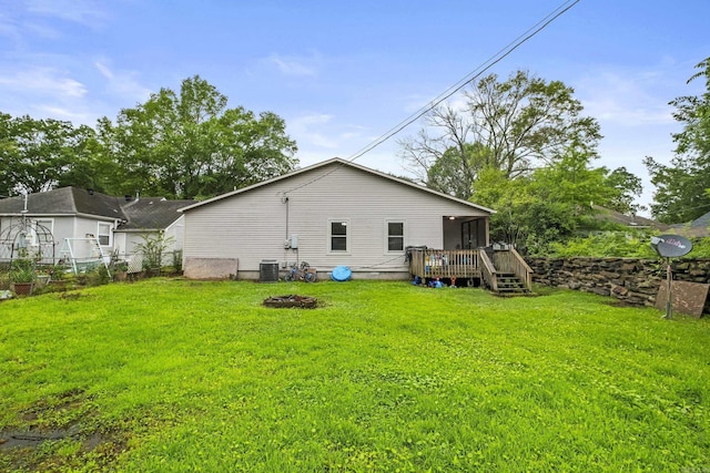 303 Pike Rd, Benton, AR 72019 - rear view of property featuring central AC unit, a sunroom, and a deck
