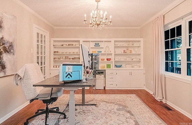 1257 Kimwood Dr, Benton, AR 72019 - home office with a textured ceiling, light wood-type flooring, a chandelier, crown molding, and baseboards