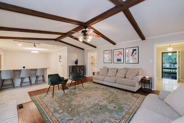 1257 Kimwood Dr, Benton, AR 72019 - living area featuring light wood-style floors, ceiling fan, ornamental molding, and baseboards