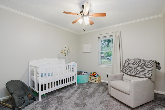 1257 Kimwood Dr, Benton, AR 72019 - carpeted bedroom with ornamental molding, baseboards, a crib, and a ceiling fan