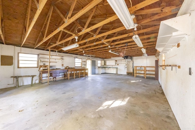 1257 Kimwood Dr, Benton, AR 72019 - garage with a workshop area