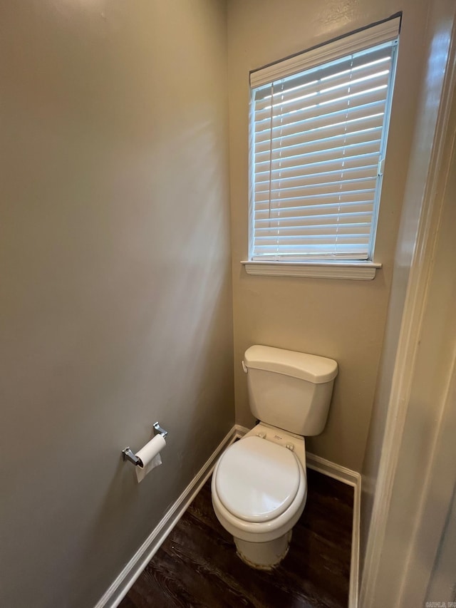 1206 E Twin Lakes Dr, Little Rock, AR 72204 - bathroom with toilet, baseboards, and wood finished floors