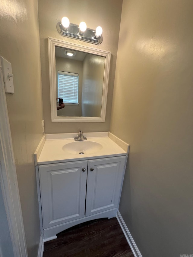 1206 E Twin Lakes Dr, Little Rock, AR 72204 - bathroom featuring vanity and wood finished floors