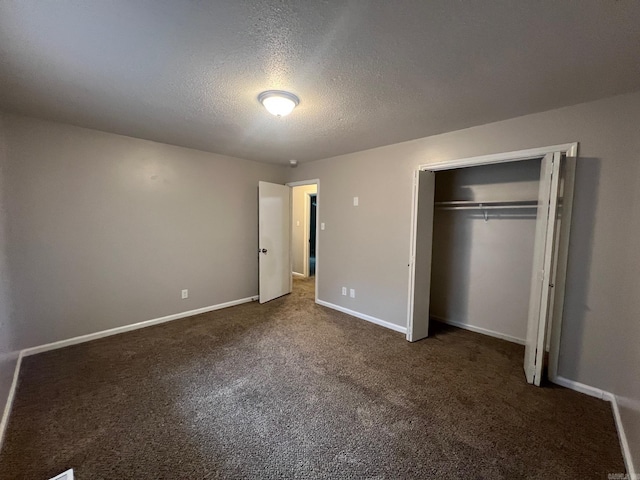 1206 E Twin Lakes Dr, Little Rock, AR 72204 - unfurnished bedroom with carpet, a textured ceiling, a closet, and baseboards