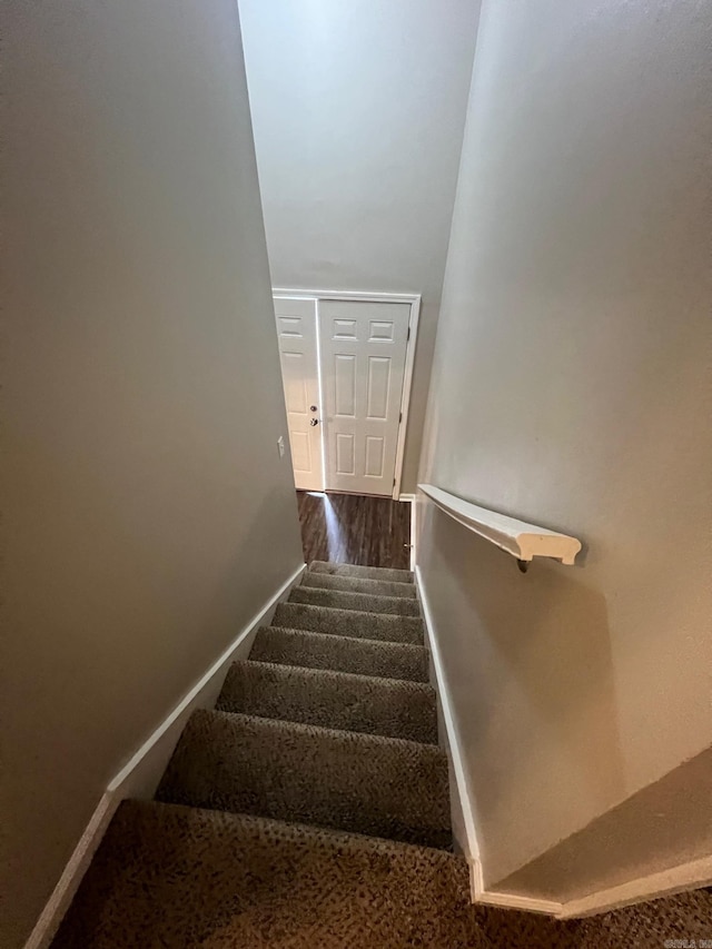 1206 E Twin Lakes Dr, Little Rock, AR 72204 - staircase with baseboards and wood finished floors