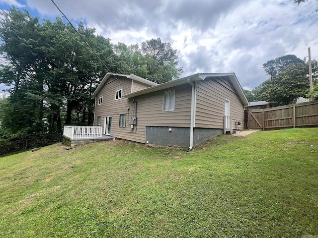 1206 E Twin Lakes Dr, Little Rock, AR 72204 - rear view of house with a deck
