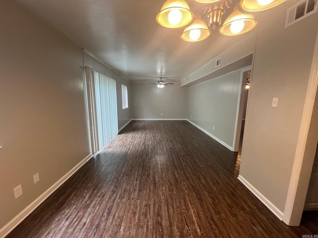 1206 E Twin Lakes Dr, Little Rock, AR 72204 - unfurnished room with dark wood finished floors, a ceiling fan, baseboards, and a chandelier