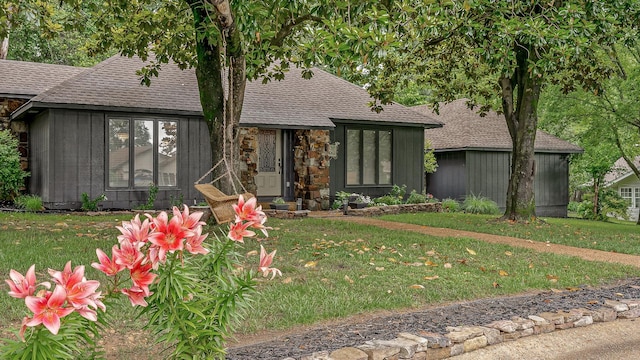 306 Cloverdale, Jonesboro, AR 72401 - view of front of house featuring a shingled roof and a front lawn