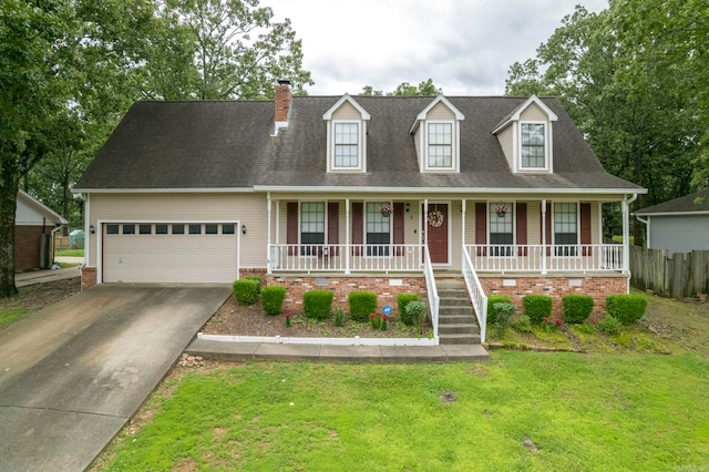 5 Briarstone Dr, Sherwood, AR 72120 - cape cod-style house with a porch, a garage, concrete driveway, and a chimney