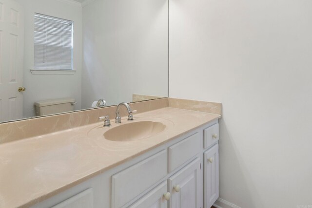 5 Briarstone Dr, Sherwood, AR 72120 - half bath with vanity, toilet, and crown molding