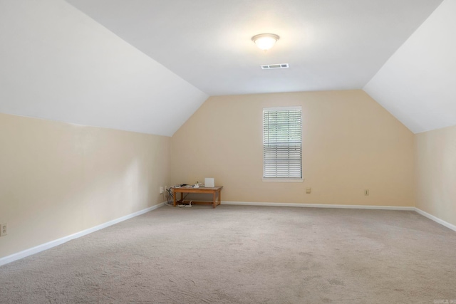 5 Briarstone Dr, Sherwood, AR 72120 - additional living space featuring vaulted ceiling, carpet flooring, and baseboards