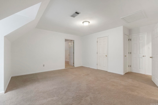 5 Briarstone Dr, Sherwood, AR 72120 - unfurnished bedroom with carpet flooring, baseboards, attic access, and ensuite bathroom