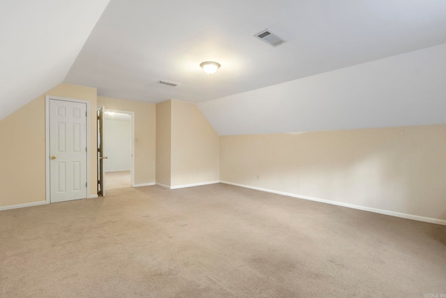 5 Briarstone Dr, Sherwood, AR 72120 - bonus room with vaulted ceiling, light colored carpet, and baseboards