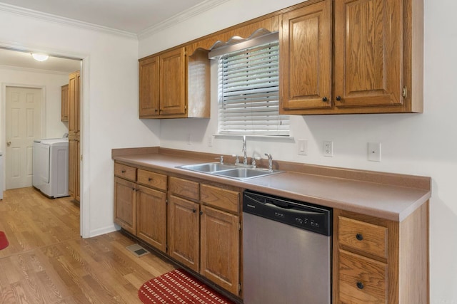 5 Briarstone Dr, Sherwood, AR 72120 - kitchen with stainless steel dishwasher, a sink, brown cabinets, light wood finished floors, and crown molding