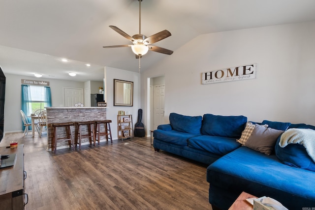 35 Summer Breeze Rd, Conway, AR 72032 - living area featuring a ceiling fan, wood finished floors, vaulted ceiling, and baseboards