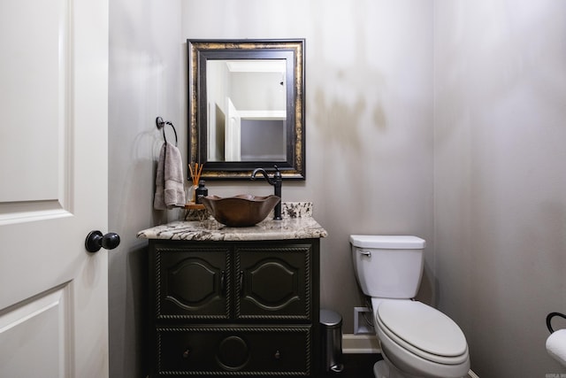 14 Cypress Valley Ct, Maumelle, AR 72113 - bathroom with toilet, vanity, and baseboards
